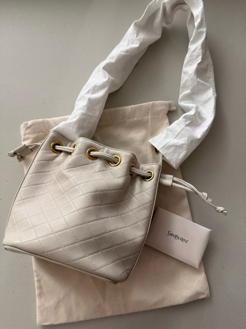 Saint Laurent Cream Quilted Leather Drawstring Bucket Bag with Gold Hardware